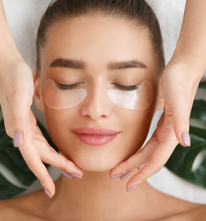 Woman getting spa facial treatment